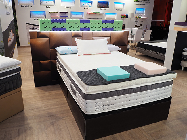 Diseño y montaje stand Dormidissimo. Vista de destacado para somieres y colchones.